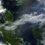 on-june-19-2013-satellites-captured-a-photo-of-smoke-billowing-from-illegally-started-wildfires-on-the-indonesian-island-of-sumatra